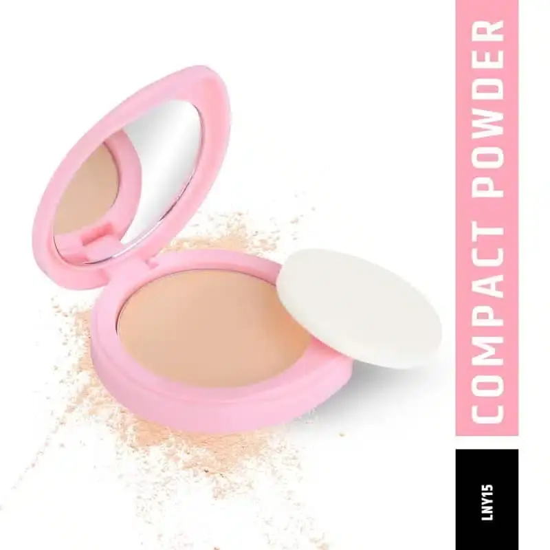 Open Insight pressed powder compact revealing an internal mirror and soft white applicator puff. - thumbnail