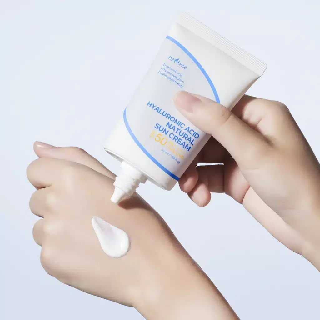 Isntree Hyaluronic Acid Suncream SPF50 white tube lying down, showing a white creamy product swatch. - thumbnail