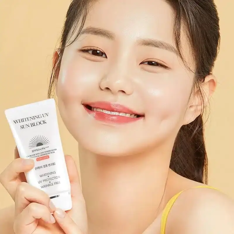 Jigott Whitening UV Sun Block 70ml tube lying angled, highlighting product details and Korean text. - thumbnail