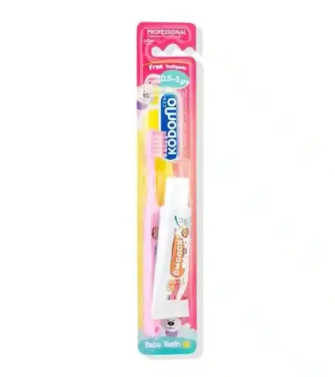 Kodomo baby toothbrush and strawberry toothpaste pack in clear blister packaging for 0.5-3 years.
