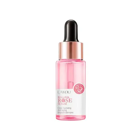 Laikou Bulgaria Rose Serum 17ml glass bottle with gold dropper and scattered rose petals.