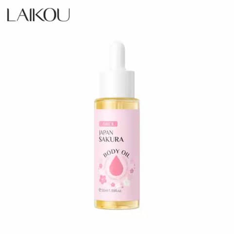 Laikou Japan Sakura Body Oil 50ml bottle with a white pump, filled with light pink liquid, standing upright.