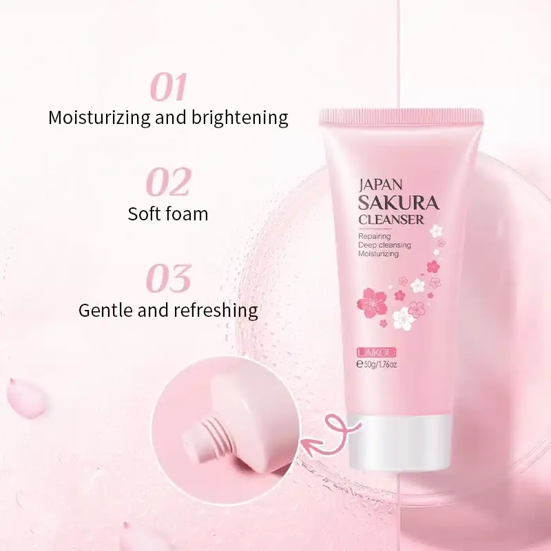 Laikou Japan Sakura Cleanser tube lying horizontally next to a white creamy foam swatch. - thumbnail