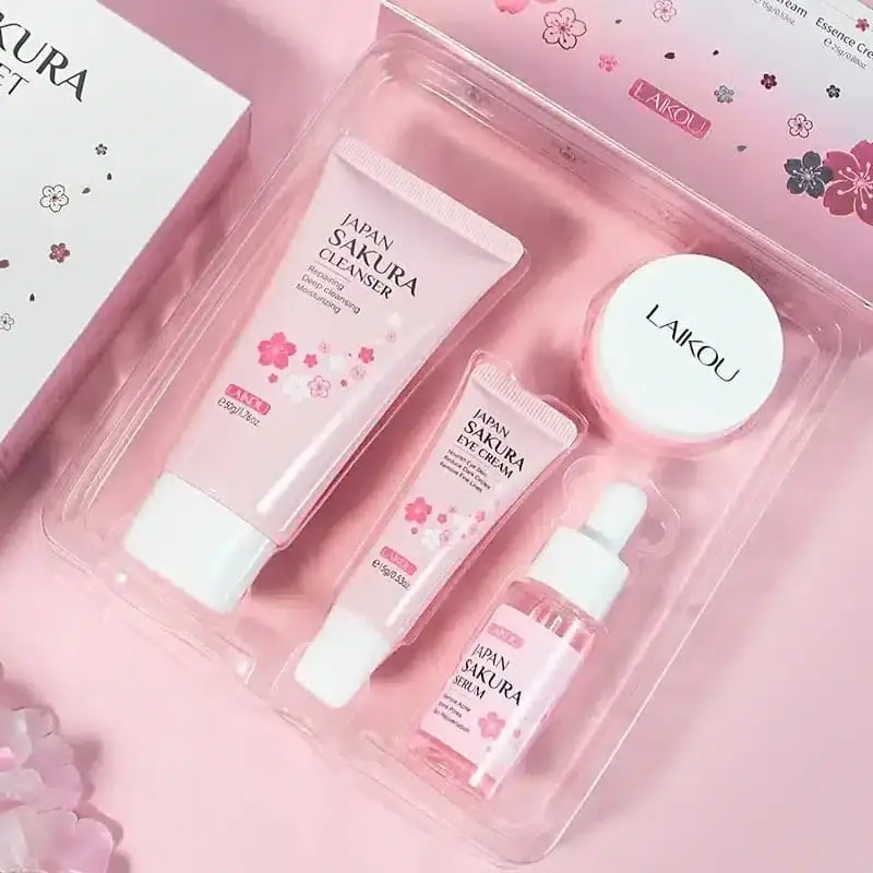 Laikou Japan Sakura skin care product revealing smooth pink cream texture on finger. - thumbnail