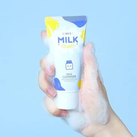 Upright white Laikou Milk Brightening Cleanser 50g tube, featuring milky design and full front label.