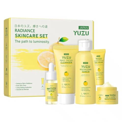 Complete Laikou Radiance Yuzu 5-piece skincare set featuring yellow bottles and tubes, neatly displayed.