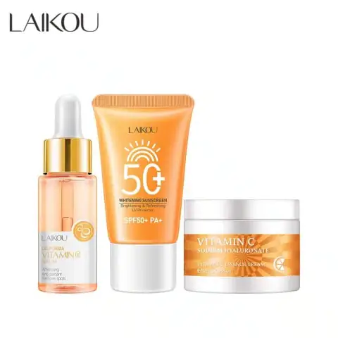 Laikou Vitamin C complete skincare set: serum bottle, cream jar, and SPF50 sunscreen tube.