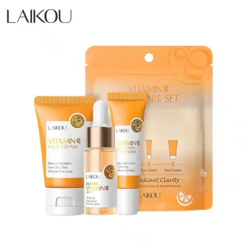 Laikou Vitamin C travel kit: three orange bottles of serum, toner, and cream.