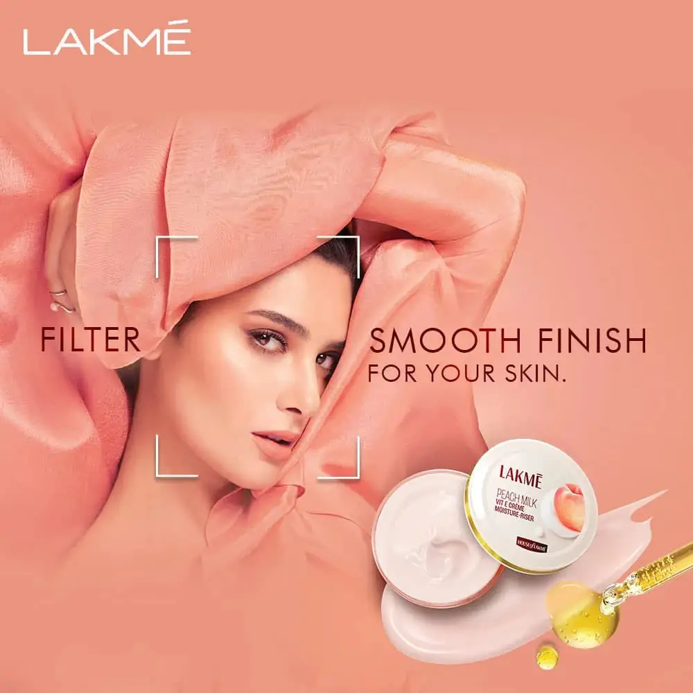 Close-up of Lakme Peach Milk Vitamin E Moisturiser 50g cream tube branding details and cap. - thumbnail