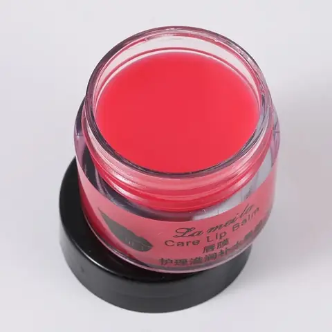 Lameila Lip Balm Mask Hydrates 01 in round pink jar with applicator on white background.