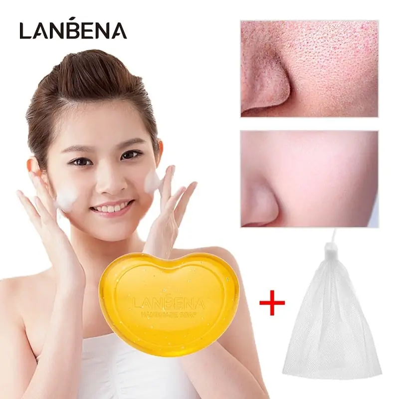 Close-up of Lanbena 24K Gold handmade soap, highlighting embedded flakes and translucent amber texture. - thumbnail