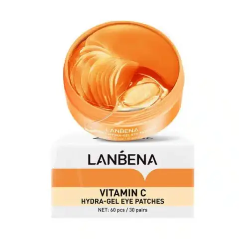 Lanbena Vitamin C Eye Patches in a bright yellow jar with a spatula on top.