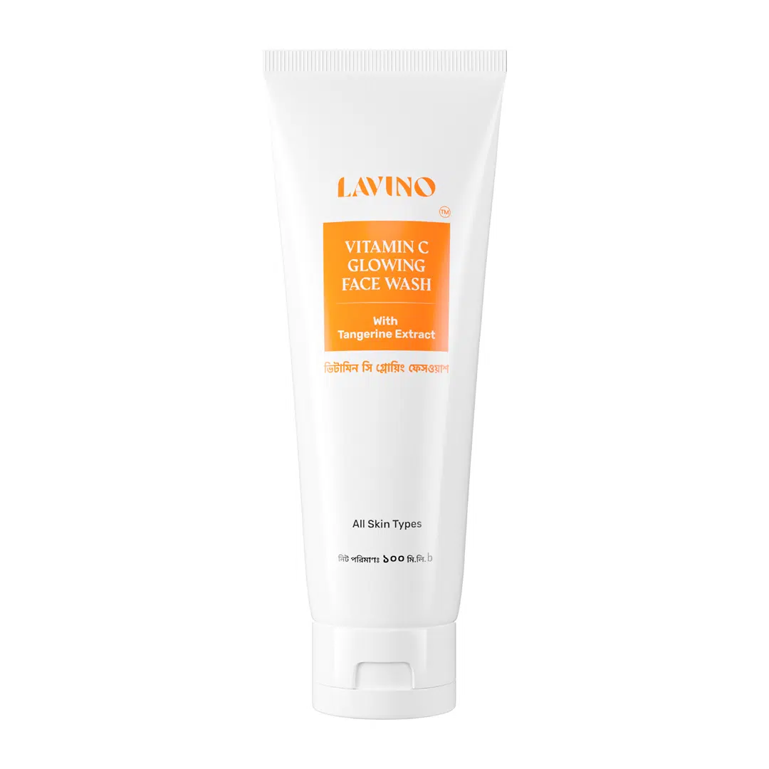 Lavino Vitamin C Face Wash 100ml tube standing upright on white background with tangerine slice. - thumbnail
