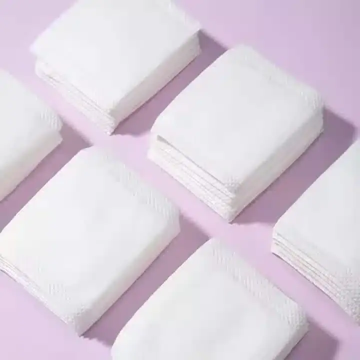 Close-up of LMLTOP cosmetic cotton pad packaging, highlighting "100 Pads" and brand logo. - thumbnail