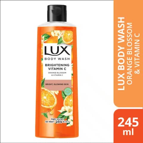 Lux Orange Blossom & Vitamin C body wash, 245ml, vibrant orange bottle with gold cap.