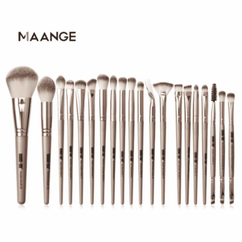 Close-up of Maange professional makeup brushes, highlighting varied shapes and soft white bristles. - thumbnail