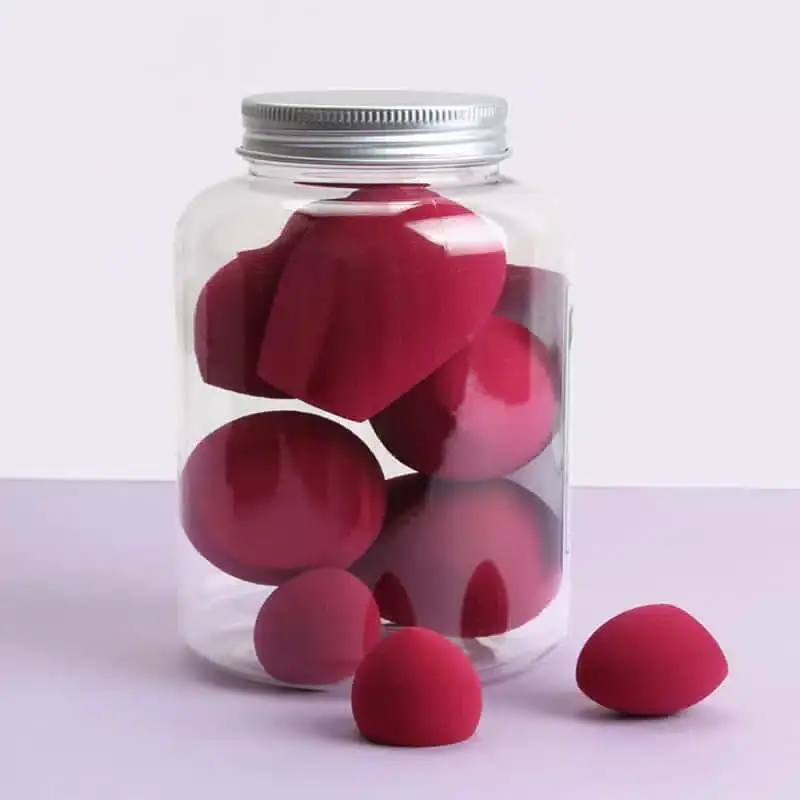 Maange 8 Pcs foundation sponges laid out, showcasing individual pastel shades and distinct shapes. - thumbnail