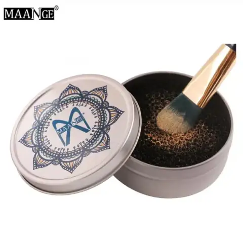 Maange black tin makeup brush cleaning box with white sponge, showcasing a pink brush.