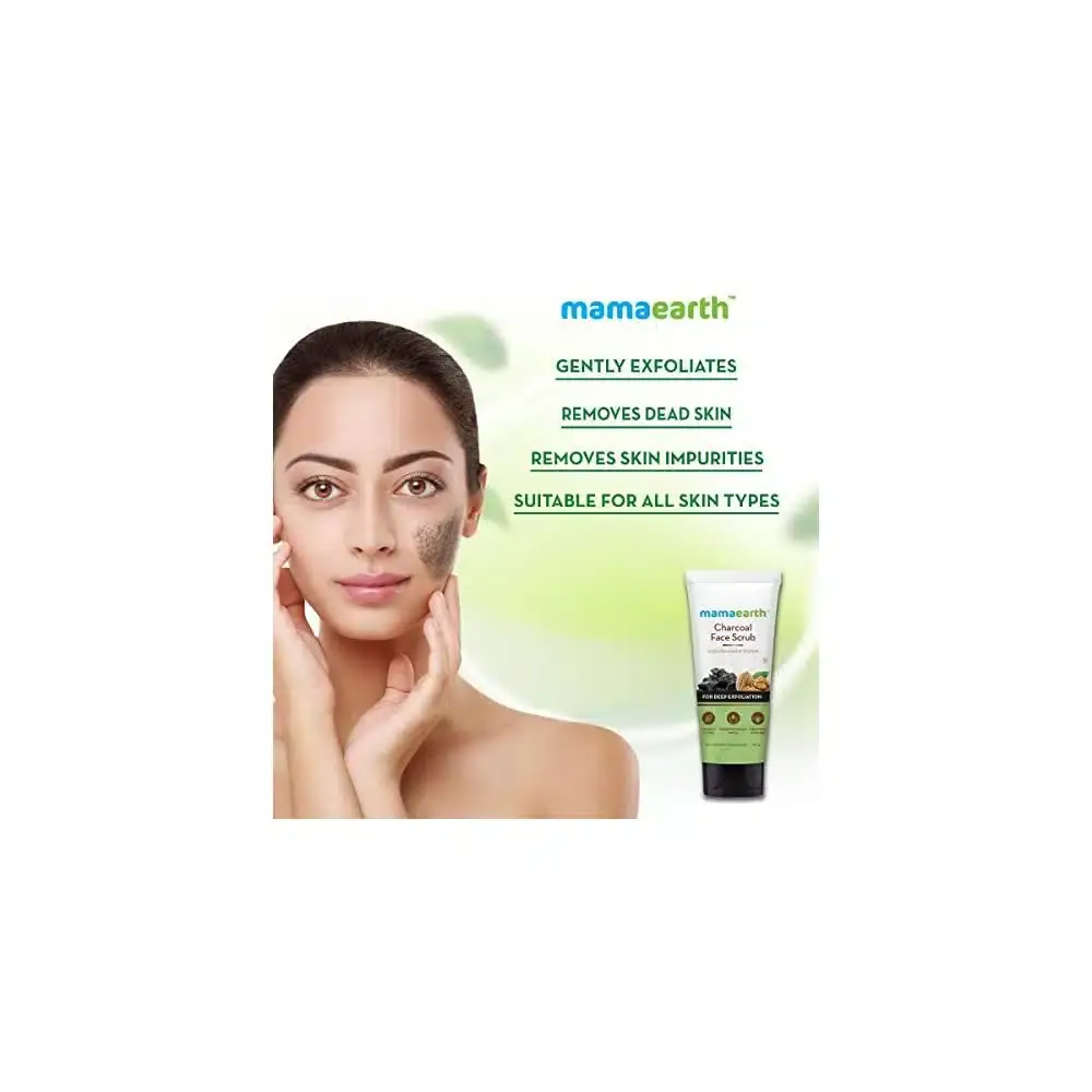 Close-up of Mamaearth Charcoal Face Scrub's dark, grainy texture applied to skin. - thumbnail