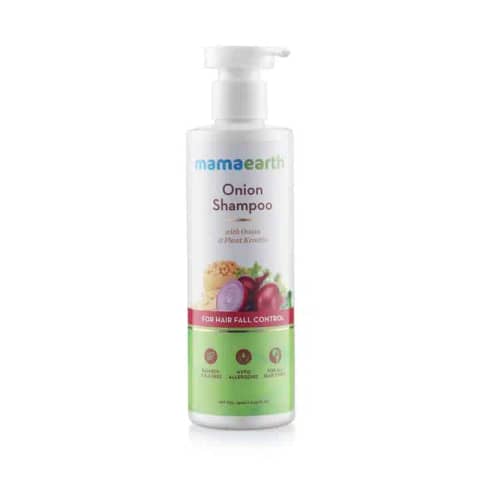 Mamaearth Onion Shampoo 250ml bottle, orange and white, for hair fall control, with pump dispenser.