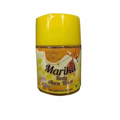 Marika Toner's sleek, transparent bottle with a shimmering gold cap, displayed front and center.