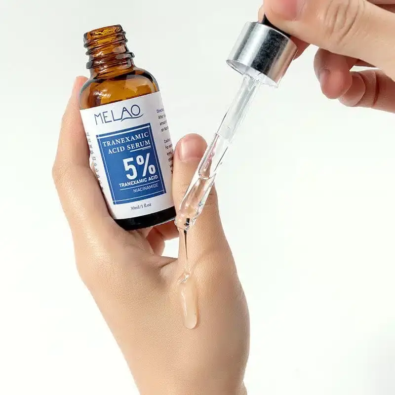 Melao 30ml Tranexamic Acid Niacinamide serum bottle from a slight angle, showing product details. - thumbnail
