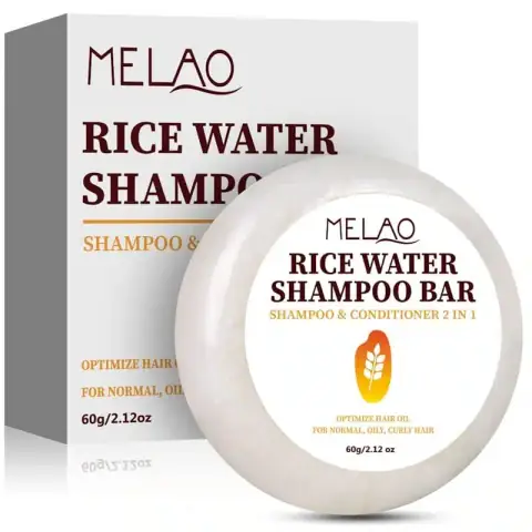 Melao Rice Water Shampoo Bar Conditioner 2-in-1, solid cream-colored circular bar, with scattered rice grains.