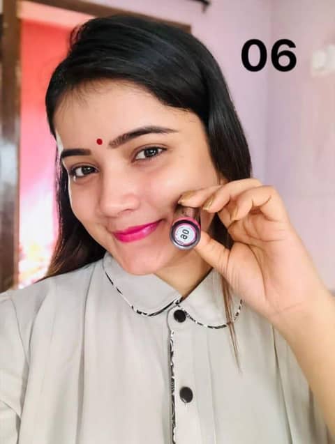 Menow Velvet Lipstick Waterproof Lipgloss 06 in a sleek black tube with gold branding, cap on.