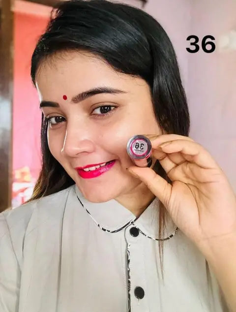 Menow Velvet Lipstick Waterproof Lipgloss #36, full product in elegant black and gold tube.