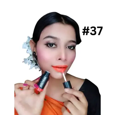 Menow Velvet Lipstick Waterproof Lipgloss in its sleek black tube with elegant gold lettering.