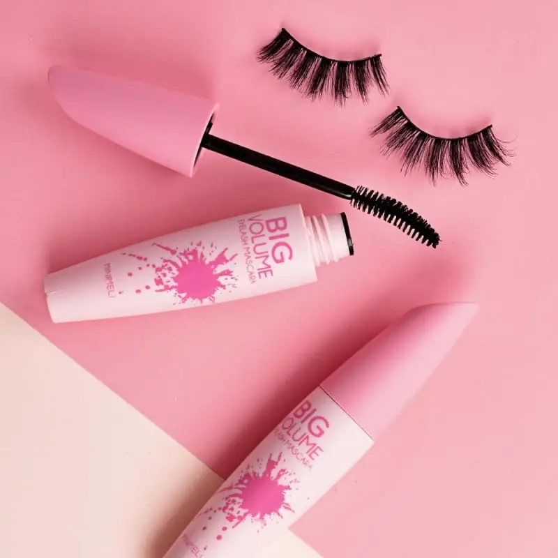 Minimeli Big Volume Hypercurl Mascara tube lying horizontally with separate brush applicator. - thumbnail