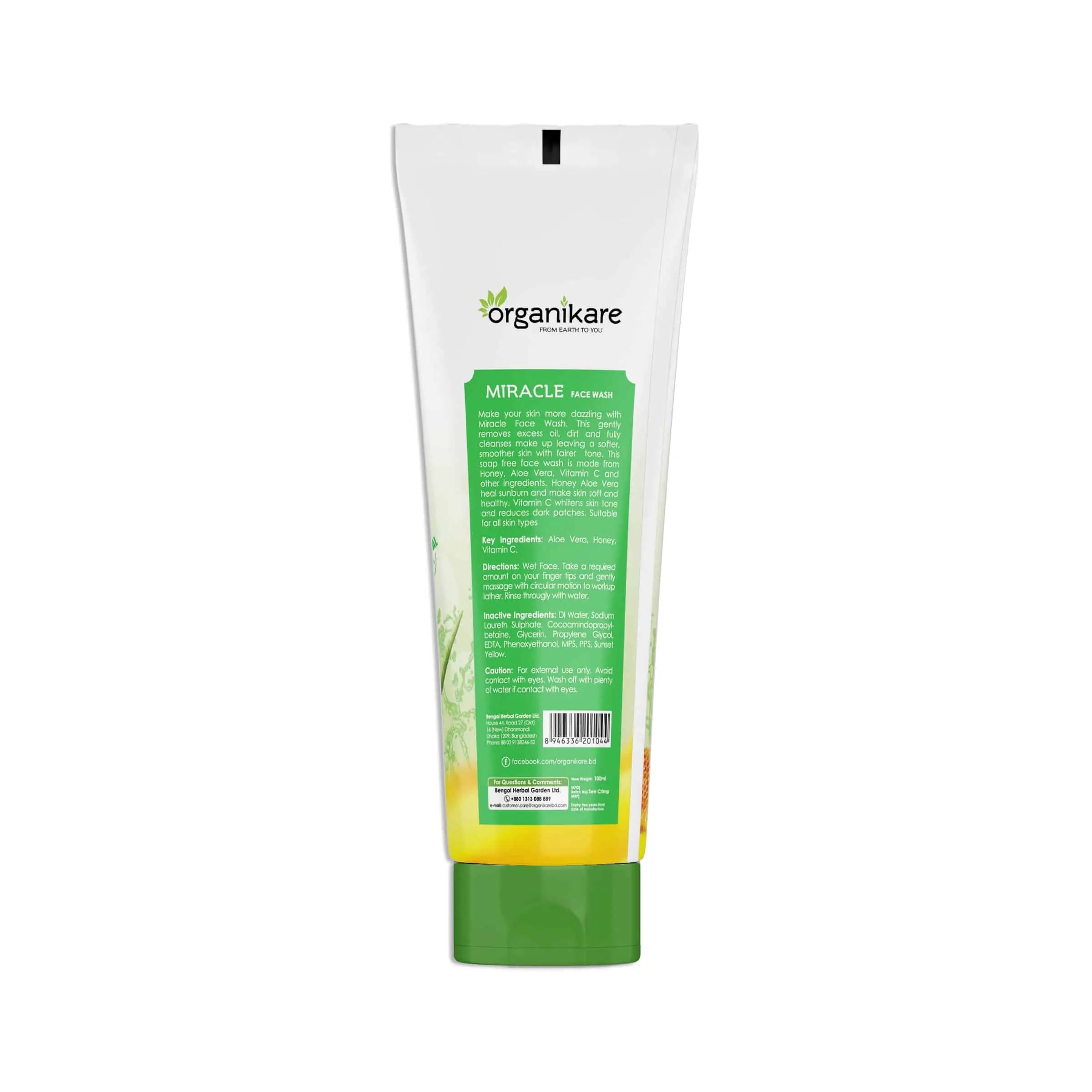 Organikare Miracle Facewash tube with green cap open, white cream product squeezed out. - thumbnail