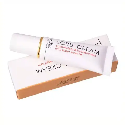 Mixiu Lip Scru Cream in clear jar, light pink exfoliating balm, small white spatula.