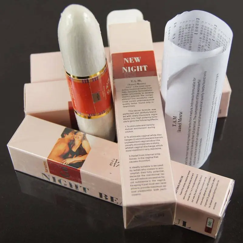 Full view of RuSu Night Beautiful serum in its clear glass bottle, highlighting its golden glow. - thumbnail