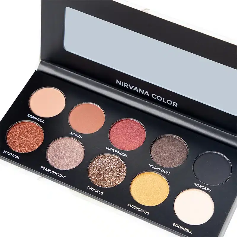 Open Nirvana Color eye shadow palette revealing 9 vibrant matte and shimmer shades with mirror. - thumbnail
