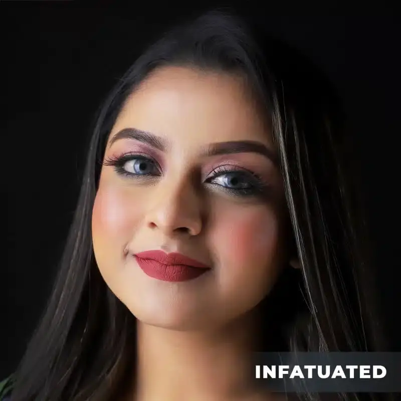 Open Nirvana Color Liquid Matte Lipstick 'Infatuated' with doe-foot applicator covered in rich color. - thumbnail