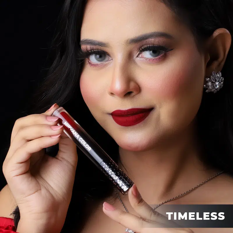 Close-up of Nirvana Liquid Matte Lipstick 'Timeless' shade, with applicator wand ready for use. - thumbnail