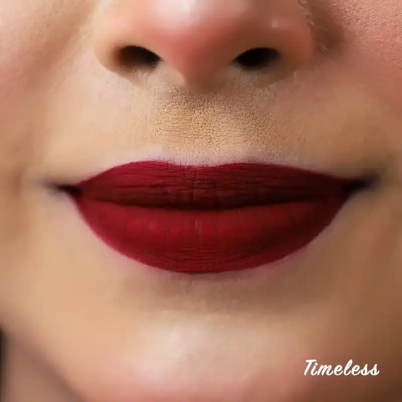 Nirvana Color Liquid Matte Lipstick 'Timeless' shade swatches clearly displayed on a model's arm. - thumbnail