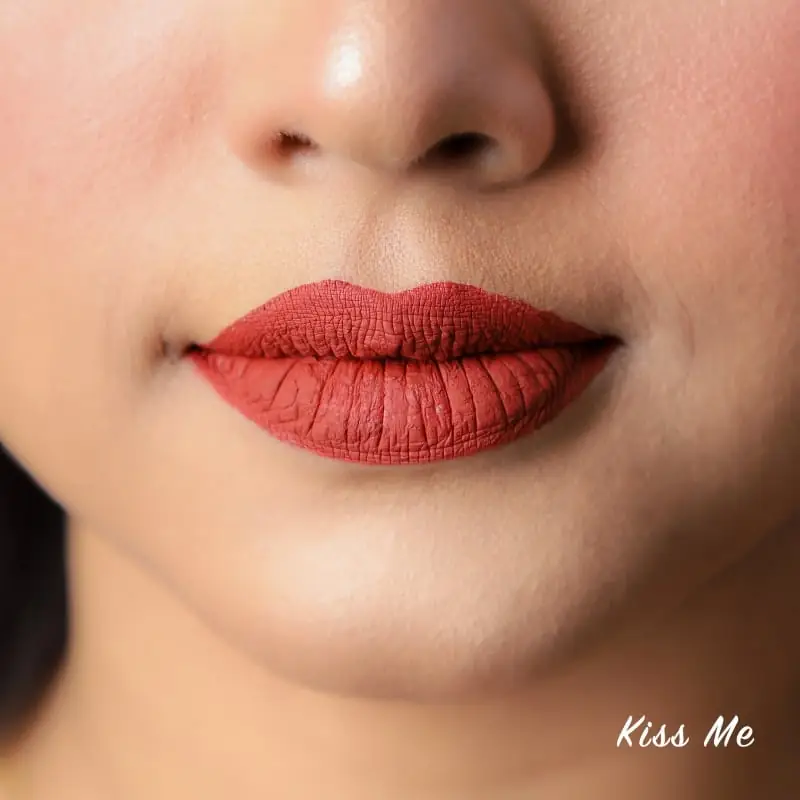 Smooth Nirvana Color Liquid Matte Lipstick "Kiss Me" shade swatched beautifully on skin. - thumbnail
