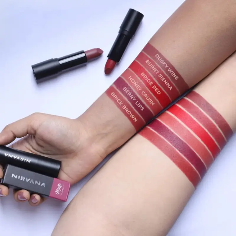Swatch of Nirvana Color Berry Lips B01 matte lipstick on skin, showing rich color payoff. - thumbnail