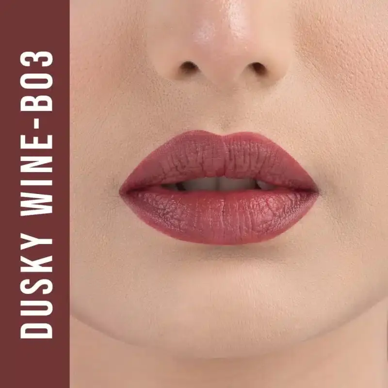 Open Nirvana matte lipstick revealing its rich Dusky Wine B03 color bullet. - thumbnail