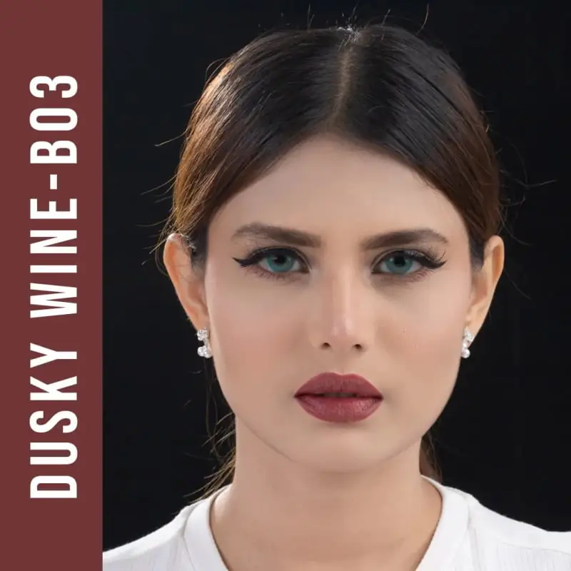 Close-up of Nirvana's Dusky Wine B03 matte lipstick bullet, highlighting its smooth texture. - thumbnail