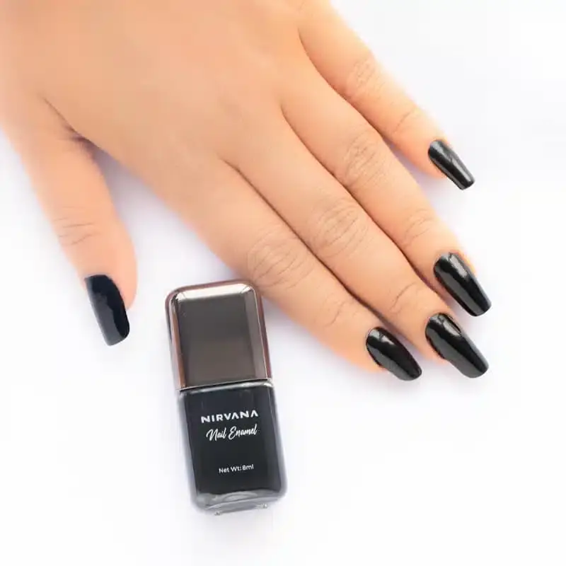 Close-up of Nirvana Black Swan 38 nail enamel bottle, tilted, showcasing the brand logo and text. - thumbnail
