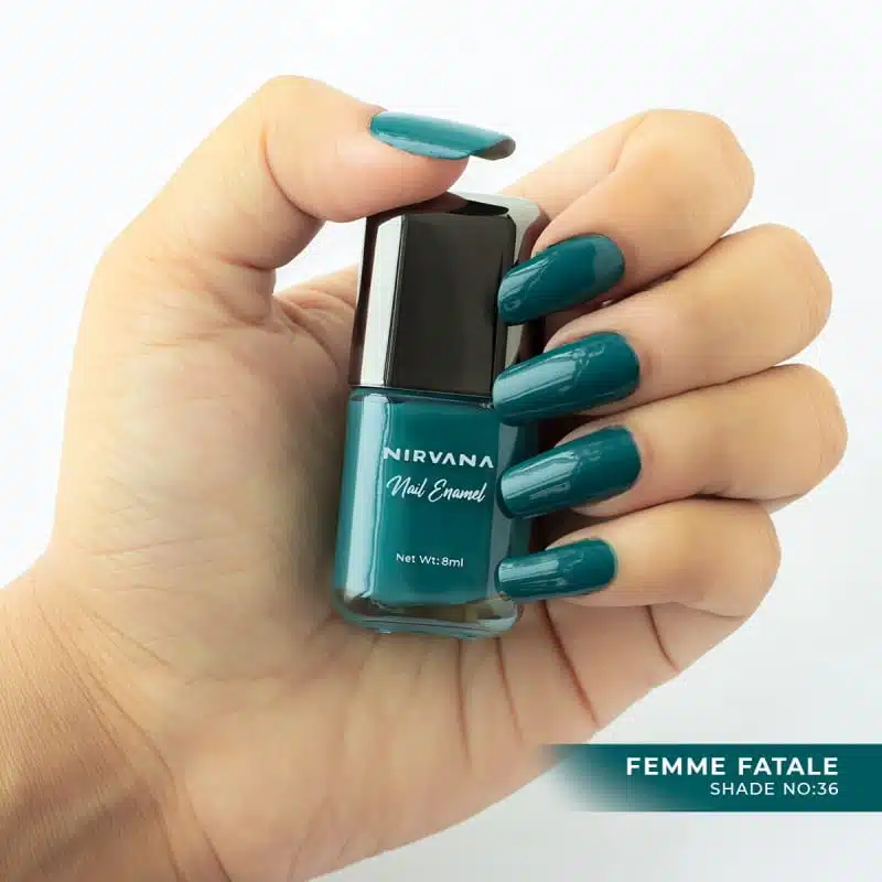 Nirvana Color Nail Enamel Femme Fatale 36 bottle, a deep red shade, standing prominently with black cap. - thumbnail