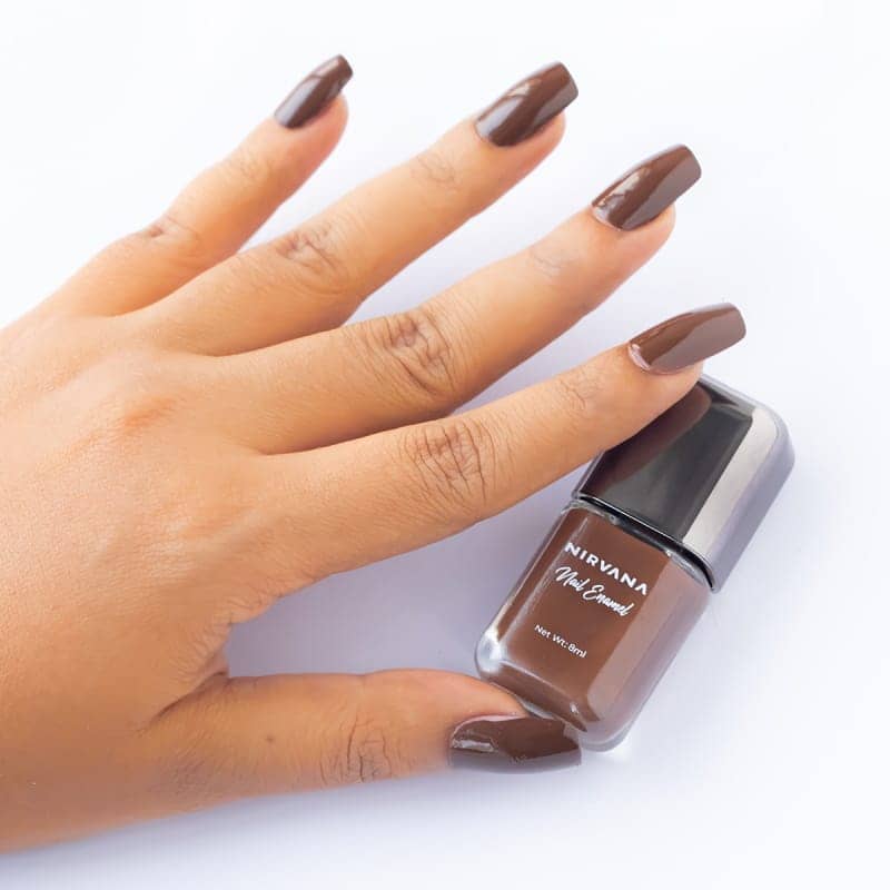 Close-up of Nirvana Color Spiced Latte nail enamel brush applicator with rich warm brown shade. - thumbnail