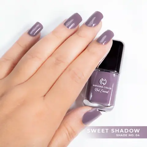 Nirvana Color Nail Enamel Sweet Shadow 04, a dusty pink nail polish bottle with black cap on white.
