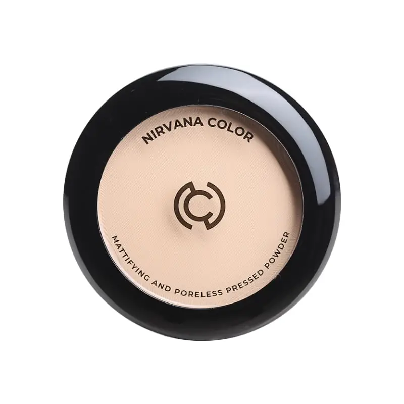 Close-up of Nirvana Light Natural mattifying pressed powder pan with subtle texture and applicator. - thumbnail