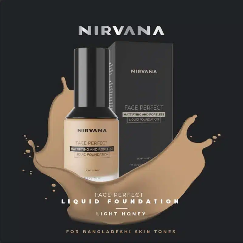 Nirvana Liquid Foundation Light Golden actively dispensing a drop from its pump. - thumbnail