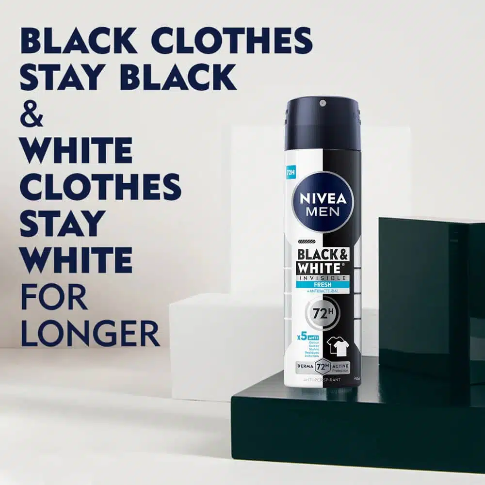 Angled view of Nivea Black & White 72H body spray can with clear cap on. - thumbnail