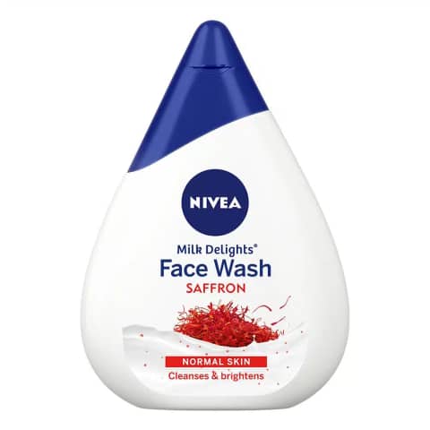 Nivea Milk Delights Saffron 100ml face wash tube, white and yellow packaging, front view.